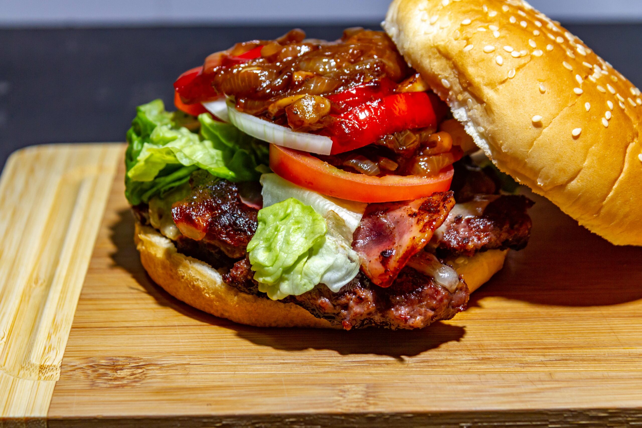 closeup-shot-of-a-delicious-burger-with-sauce-on-t-2025-02-02-22-51-08-utc-min